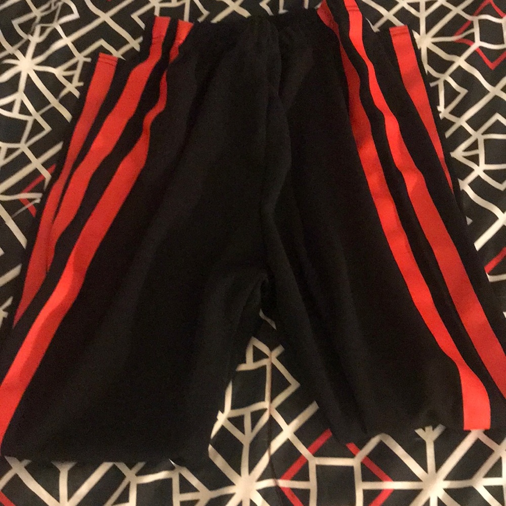 Black leggings with red stripes